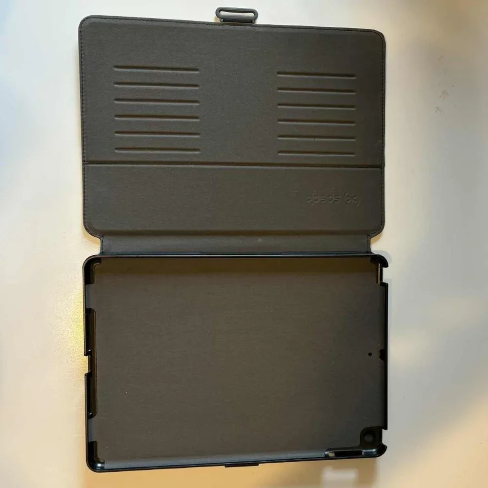 iPad case/folio with stand. New condition. Adjustable. Clasp lock. Camera shield